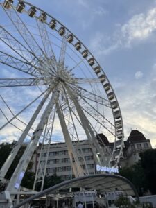 Budapest Eye Ferris wheel towering against the sky, offering panoramic views of the city from Erzsébet Square.